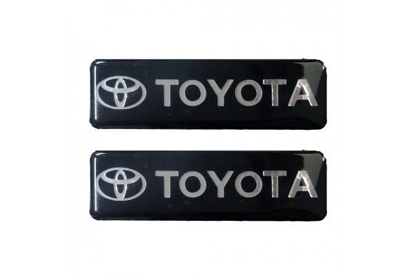 Toyota Σηματα Βιδωτα 10 Χ 3 cm Εποξειδικης Ρυτινης (ΥΓΡΟ ΓΥΑΛΙ) Σε ΜΑΥΡΟ/ΧΡΩΜΙΟ Για Πατακια - 2 ΤΕΜ.