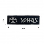 Toyota Yaris Σηματα Βιδωτα 10 Χ 3 cm Εποξειδικης Ρυτινης (ΥΓΡΟ ΓΥΑΛΙ) Σε ΜΑΥΡΟ/ΧΡΩΜΙΟ Για Πατακια - 2 ΤΕΜ.