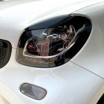 Φρυδάκια Μπροστινών Φαναριών Για Smart Fortwo 453 2014+ Βαμμένα Μάυρο Γυαλιστερό Χρώμα 2 Τεμάχια